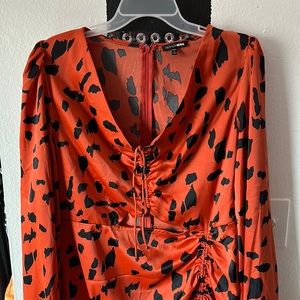 Fashion nova – orange with black spots dress - Size: 1XL